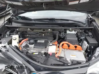 2018 Toyota RAV4 Hybrid SE with VIN JTMJJREV7JD208249, listed as a IAAI auction lot 41859301 with 91,899 mi miles and . Bid and sale history available at DreamBid. Image 10.