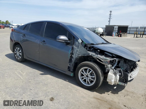 2020 Toyota Prius L Eco z VIN JTDKARFU9L3105675, wystawiony jako Copart lot #54587165 z przebiegiem 130 560 mil mil oraz Szkoda całkowita • Salvage title. Historia ofert i sprzedaży dostępna na DreamBid. Obrazek 4.
