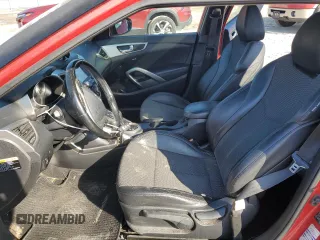 2014 Hyundai Veloster z VIN KMHTC6AD3EU217143, wystawiony jako Copart lot #43716395 z przebiegiem 137 865 mil mil oraz Szkoda całkowita • Salvage title. Historia ofert i sprzedaży dostępna na DreamBid. Obrazek 7.