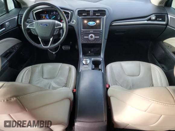 2017 Ford Fusion Titanium z VIN 3FA6P0SU0HR290201, wystawiony jako Copart lot #60106095 z przebiegiem 98 086 mil mil oraz Szkoda całkowita • Salvage title. Historia ofert i sprzedaży dostępna na DreamBid. Obrazek 8.