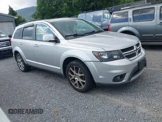 2014 Dodge Journey R/T with VIN 3C4PDDEG7ET139410, listed as a IAAI auction lot 42808542 with 185,712 mi miles and . Bid and sale history available at DreamBid. Image 1.