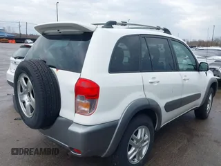 2003 Toyota RAV4 with VIN JTEGH20V730111000, listed as a IAAI auction lot 41955312 with 211,623 mi miles. Bid and sale history available at carsss.com. Image 4.
