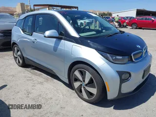 2014 BMW i3 with VIN WBY1Z4C54EVX62877, listed as a IAAI auction lot 42543587 with 68,214 mi miles and . Bid and sale history available at DreamBid. Image 1.