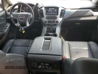 2017 GMC Yukon SLT z VIN 1GKS1BKC4HR375877, wystawiony jako Copart lot #55150545 z przebiegiem 144 788 mil mil oraz Szkoda całkowita • Salvage title. Historia ofert i sprzedaży dostępna na DreamBid. Obrazek 8.
