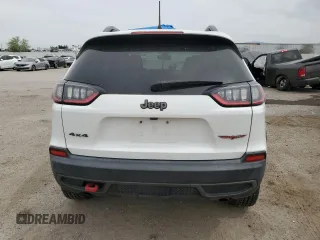 2020 Jeep Cherokee Trailhawk with VIN 1C4PJMBX9LD504136, listed as a Copart auction lot 58975865 with 79,515 mi miles and Salvage title. Bid and sale history available at DreamBid. Image 6.
