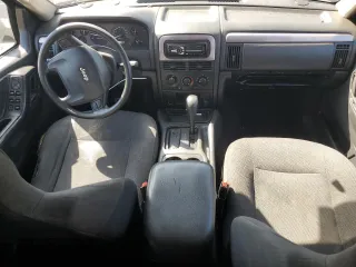 2003 Jeep Grand Cherokee Laredo with VIN 1J4GX48S73C539185, listed as a Copart auction lot 46687915 with 265,008 mi miles and Salvage Title. Bid and sale history available at carsss.com. Image 8.