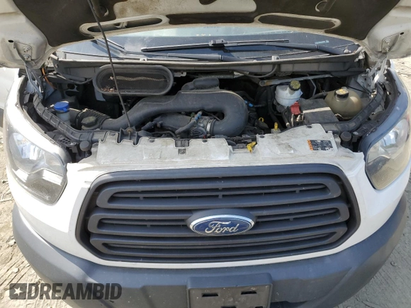 2018 Ford Transit z VIN 1FTYR1ZM0JKA09453, wystawiony jako Copart lot #55241035 z przebiegiem 227 932 mil mil oraz Szkoda całkowita • Salvage title. Historia ofert i sprzedaży dostępna na DreamBid. Obrazek 11.