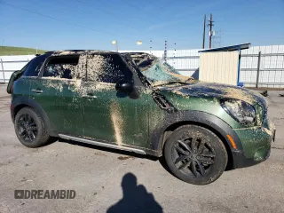 2016 MINI Countryman S with VIN WMWZC5C55GWU04046, listed as a Copart auction lot 56318715 with 206,223 mi miles and Non repairable. Bid and sale history available at DreamBid. Image 4.