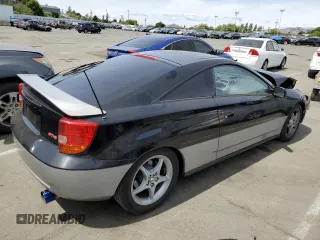 2000 Toyota Celica GTS with VIN JTDDY38T1Y0015712, listed as a Copart auction lot 57557284 with 166,453 mi miles and Salvage Title. Bid and sale history available at carsss.com. Image 3.