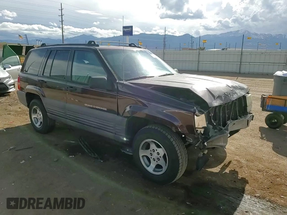 1997 Jeep Grand Cherokee Laredo with VIN 1J4GZ58S1VC747713, listed as a Copart auction lot 55290275 with 159,846 mi miles and Salvage title. Bid and sale history available at DreamBid. Image 13.
