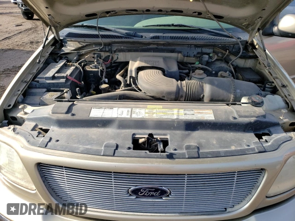 2000 Ford F-150 XL with VIN 1FTRF18L9YKA95457, listed as a Copart auction lot 67083164 with 97,988 mi miles and Salvage title. Bid and sale history available at DreamBid. Image 11.