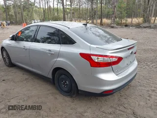 2014 Ford Focus Titanium with VIN 1FADP3J20EL148417, listed as a IAAI auction lot 41954291 with 120,098 mi miles. Bid and sale history available at carsss.com. Image 3.