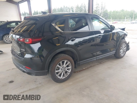 2023 Mazda CX-5 S Carbon Edition z VIN JM3KFBCM8P0140333, wystawiony jako IAAI lot #42292848 z przebiegiem 49 587 mil mil oraz . Historia ofert i sprzedaży dostępna na DreamBid. Obrazek 4.