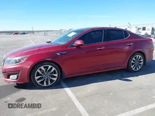 2015 Kia Optima SX Turbo with VIN 5XXGR4A64FG396164, listed as a IAAI auction lot 41682721 with 143,420 mi miles. Bid and sale history available at carsss.com. Image 15.