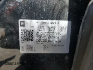 2021 GMC Acadia SLT with VIN 1GKKNMLS6MZ129235, listed as a Copart auction lot 57599215 with 91,820 mi miles and Salvage title. Bid and sale history available at DreamBid. Image 13.