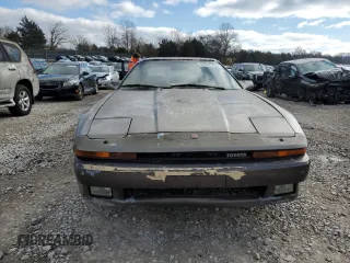 1986 Toyota Supra z VIN JT2MA70L3G0009411, wystawiony jako Copart lot #87545755 z przebiegiem 151 108 mil mil oraz Czysty tytuł • Clean title. Historia ofert i sprzedaży dostępna na DreamBid. Obrazek 5.