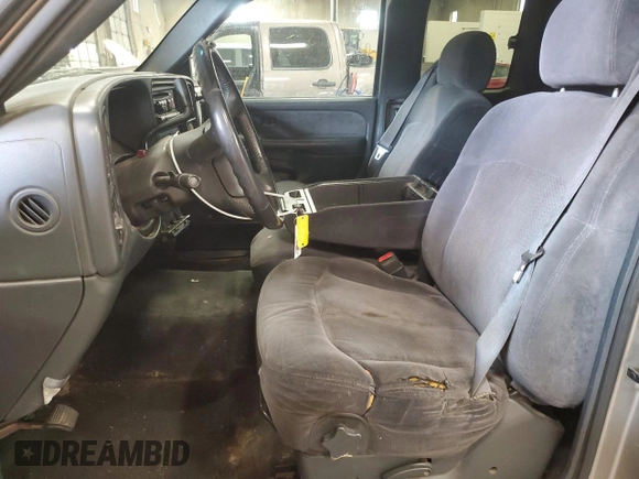 2000 Chevrolet Silverado 1500 LS with VIN 2GCEK19T9Y1374061, listed as a Copart auction lot 50147485 with 161,766 mi miles and Salvage Title. Bid and sale history available at carsss.com. Image 7.