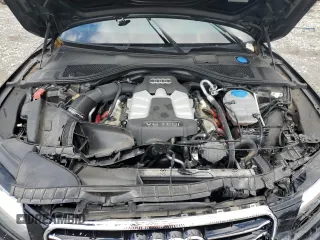 2013 Audi A7 Prestige z VIN WAU2GAFC1DN072732, wystawiony jako Copart lot #54791975 z przebiegiem 54 506 mil mil oraz Szkody całkowita. Historia ofert i sprzedaży dostępna na DreamBid. Obrazek 11.