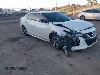 2016 Nissan Maxima SV with VIN 1N4AA6APXGC439656, listed as a IAAI auction lot 40901272 with 130,519 mi miles and . Bid and sale history available at DreamBid. Image 1.