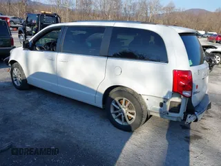 2019 Dodge Grand Caravan SXT with VIN 2C4RDGCG2KR775177, listed as a IAAI auction lot 41363146 with 129,739 mi miles and . Bid and sale history available at DreamBid. Image 3.