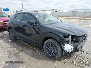 2024 Mazda CX-30 2.5 S with VIN 3MVDMBAM9RM654572, listed as a IAAI auction lot 41955821 with 23,660 mi miles. Bid and sale history available at carsss.com. Image 1.