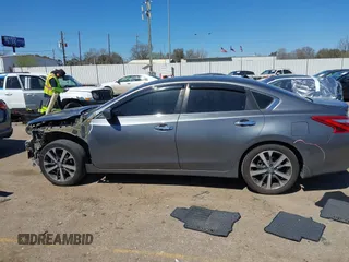 2016 Nissan Altima SR with VIN 1N4AL3AP1GC285363, listed as a IAAI auction lot 41754598 with 121,923 mi miles and . Bid and sale history available at carsss.com. Image 14.