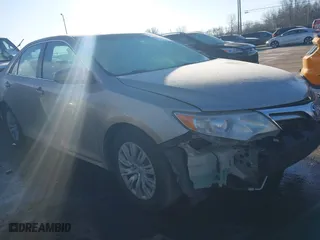 2013 Toyota Camry Hybrid LE with VIN 4T1BD1FK8DU093467, listed as a IAAI auction lot 41585354 with 239,604 mi miles. Bid and sale history available at carsss.com. Image 1.