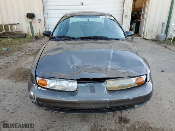 2000 Saturn SL with VIN 1G8ZJ5274YZ256204, listed as a Copart auction lot 79502124 with 190,120 mi miles and Salvage Title. Bid and sale history available at carsss.com. Image 5.