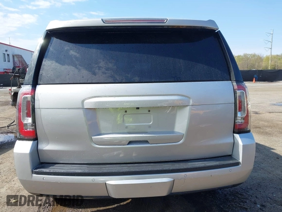 2015 GMC Yukon SLE with VIN 1GKS1AKC8FR540627, listed as a IAAI auction lot 42004023 with 128,195 mi miles. Bid and sale history available at carsss.com. Image 16.