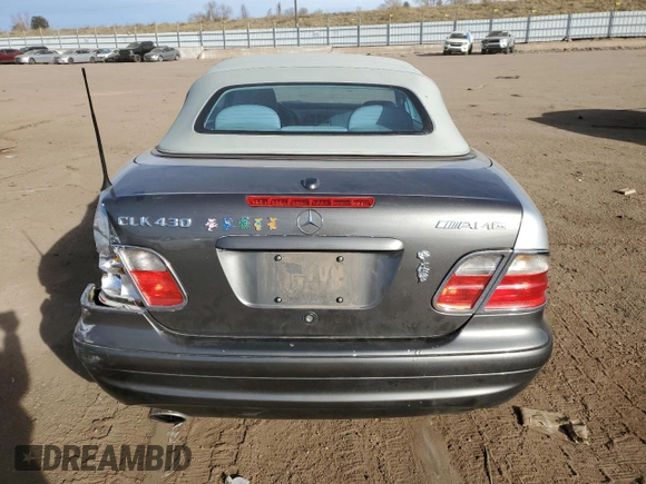 2001 Mercedes-Benz CLK 320/430 z VIN WDBLK70G41T057037, wystawiony jako Copart lot #81661884 z przebiegiem 63 580 mil mil oraz Szkody całkowita. Historia ofert i sprzedaży dostępna na DreamBid. Obrazek 6.