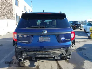 2020 Honda Passport Touring with VIN 5FNYF7H90LB004665, listed as a IAAI auction lot 41669821 with 59,768 mi miles and . Bid and sale history available at DreamBid. Image 17.