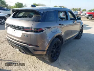 2020 Land Rover Range Rover Evoque S with VIN SALZJ2FX0LH073534, listed as a IAAI auction lot 41871038 with 91,995 mi miles and . Bid and sale history available at DreamBid. Image 4.