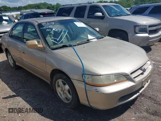 2000 Honda Accord EX z VIN 1HGCG1657YA004278, wystawiony jako IAAI lot #42240210 z przebiegiem 484 941 mil mil oraz . Historia ofert i sprzedaży dostępna na DreamBid. Obrazek 1.
