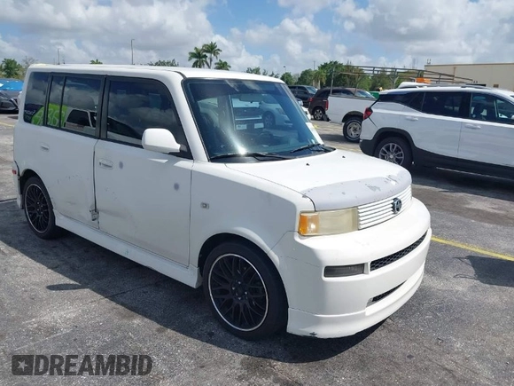 2006 Scion xB with VIN JTLKT324764043242, listed as a IAAI auction lot 41935037 with 180,799 mi miles. Bid and sale history available at carsss.com. Image 1.
