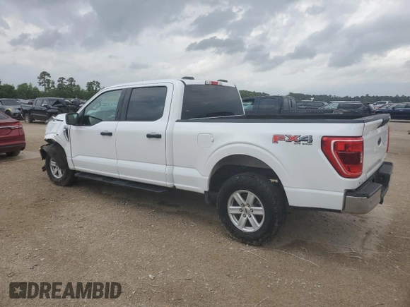 2022 Ford F-150 XL with VIN 1FTFW1E82NFA51713, listed as a Copart auction lot 54581755 with 69,966 mi miles and Salvage Title. Bid and sale history available at DreamBid. Image 2.