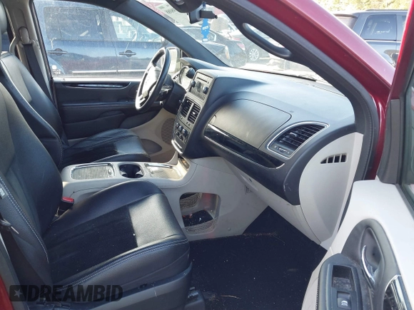 2014 Dodge Grand Caravan SXT with VIN 2C4RDGCG8ER311850, listed as a IAAI auction lot 40598088 with 138,010 mi miles and . Bid and sale history available at DreamBid. Image 5.