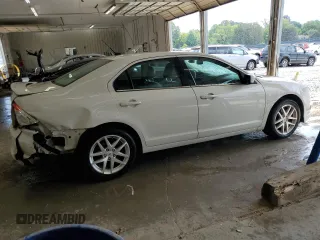 2012 Ford Fusion SEL z VIN 3FAHP0JG9CR164030, wystawiony jako Copart lot #62926985 z przebiegiem 136 043 mil mil oraz Szkoda całkowita • Salvage title. Historia ofert i sprzedaży dostępna na DreamBid. Obrazek 3.