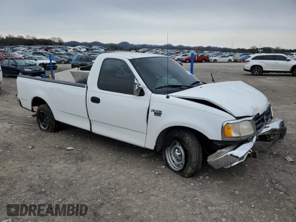 2000 Ford F-150 XL with VIN 1FTRF17WXYNC00937, listed as a Copart auction lot 47680805 with 141,759 mi miles and Salvage title. Bid and sale history available at DreamBid. Image 4.