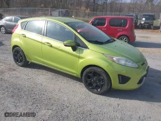 2011 Ford Fiesta SES with VIN 3FADP4FJ4BM108857, listed as a IAAI auction lot 41848272 with 138,943 mi miles. Bid and sale history available at carsss.com. Image 1.