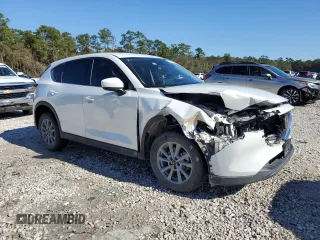 2023 Mazda CX-5 S Select with VIN JM3KFBBM0P0164854, listed as a Copart auction lot 85773384 with 41,372 mi miles and Salvage Title. Bid and sale history available at carsss.com. Image 4.