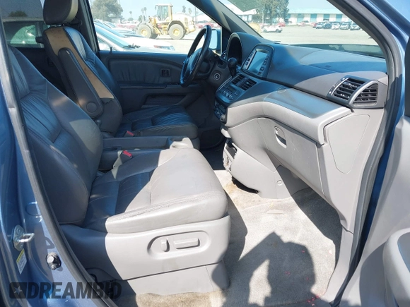 2010 Honda Odyssey Touring with VIN 5FNRL3H92AB056186, listed as a IAAI auction lot 41851386 with 199,109 mi miles. Bid and sale history available at carsss.com. Image 5.
