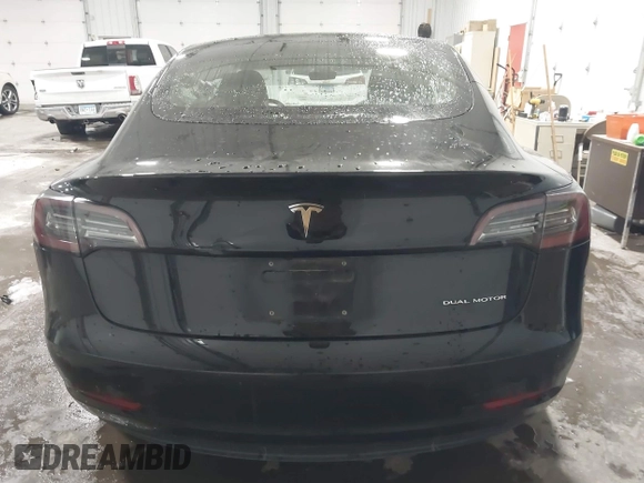 2018 Tesla Model 3 Long Range Battery with VIN 5YJ3E1EB7JF086778, listed as a IAAI auction lot 41348008 with 74,491 mi miles and . Bid and sale history available at DreamBid. Image 16.
