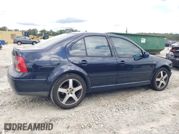 2000 Volkswagen Jetta with VIN 3VWSE29M7YM028198, listed as a Copart auction lot 73648504 with 265,184 mi miles and Salvage title. Bid and sale history available at DreamBid. Image 3.