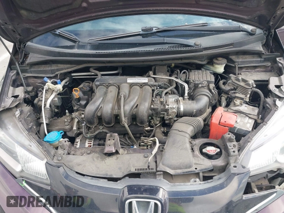 2015 Honda Fit EX-L with VIN 3HGGK5H89FM758572, listed as a IAAI auction lot 41784414 with 97,707 mi miles. Bid and sale history available at carsss.com. Image 10.