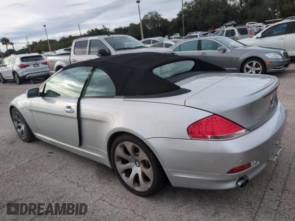 2006 BMW 6 Series 650Ci z VIN WBAEK13406CN72159, wystawiony jako Copart lot #75078214 z przebiegiem Nie podano mil oraz Szkoda całkowita • Salvage title. Historia ofert i sprzedaży dostępna na DreamBid. Obrazek 2.