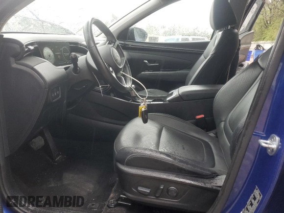 2022 Hyundai Tucson SEL with VIN 5NMJC3AE2NH099841, listed as a Copart auction lot 52415155 with 58,571 mi miles and Salvage Title. Bid and sale history available at carsss.com. Image 7.