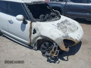 2019 MINI Countryman Cooper z VIN WMZYS7C50K3F46041, wystawiony jako IAAI lot #42085025 z przebiegiem Nie podano mil oraz . Historia ofert i sprzedaży dostępna na DreamBid. Obrazek 14.