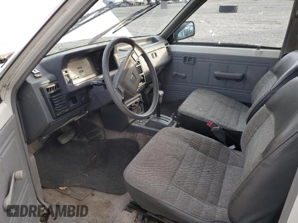 1989 Mazda B-Series Truck z VIN JM2UF3136K0755419, wystawiony jako Copart lot #81501824 z przebiegiem 113 124 mil mil oraz Szkoda całkowita • Salvage title. Historia ofert i sprzedaży dostępna na DreamBid. Obrazek 8.