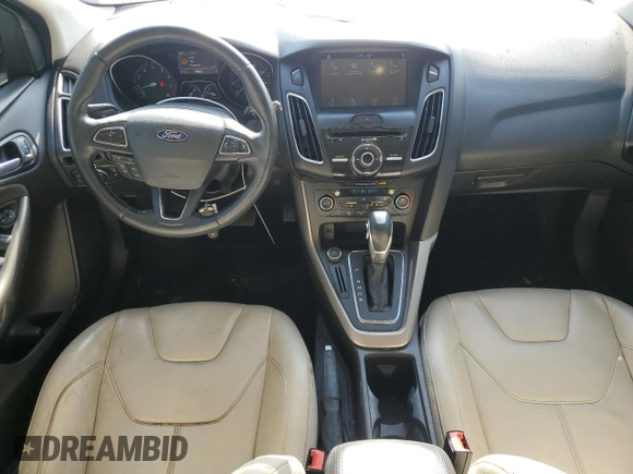 2016 Ford Focus Titanium with VIN 1FADP3N24GL302625, listed as a Copart auction lot 59180675 with 97,401 mi miles and Salvage title. Bid and sale history available at DreamBid. Image 8.