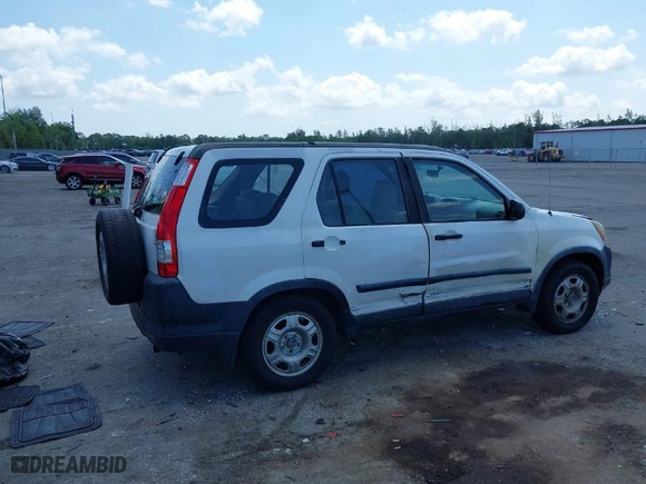 2005 Honda CR-V LX with VIN JHLRD68565C005484, listed as a IAAI auction lot 41983513 with 215,839 mi miles. Bid and sale history available at carsss.com. Image 4.